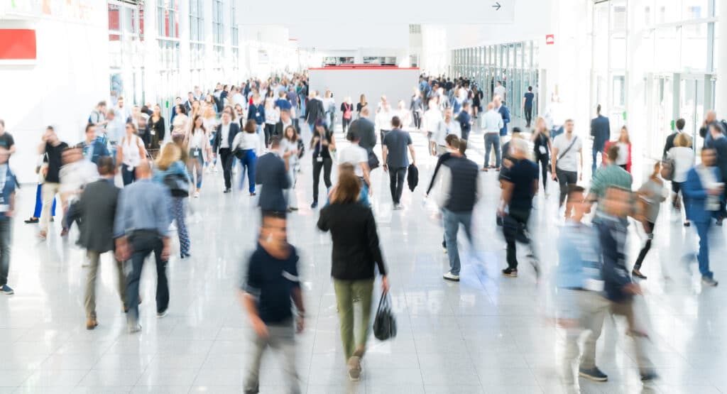 blurred business people blurred business people at a trade fair